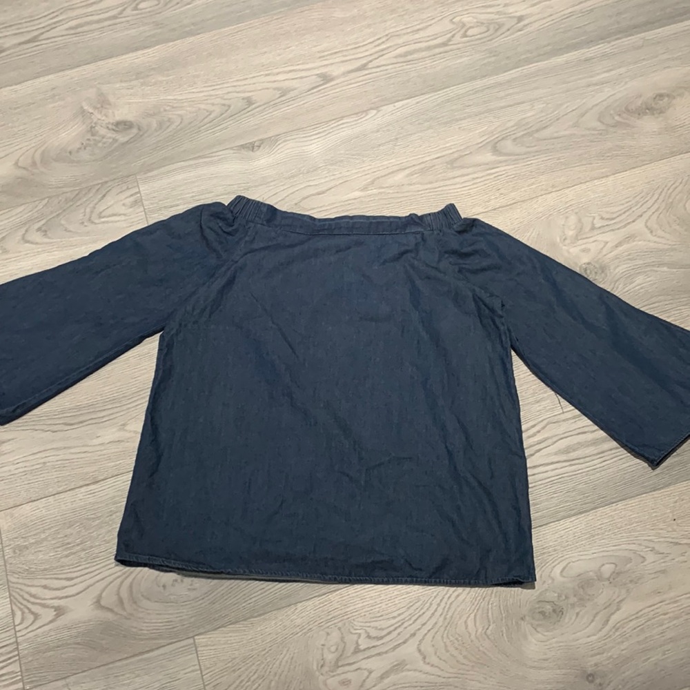 The limited off shoulder denim blouse